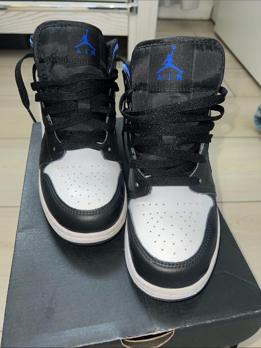 Jordan Kids Black and White High-Top Sneakers with Blue Jumpman
